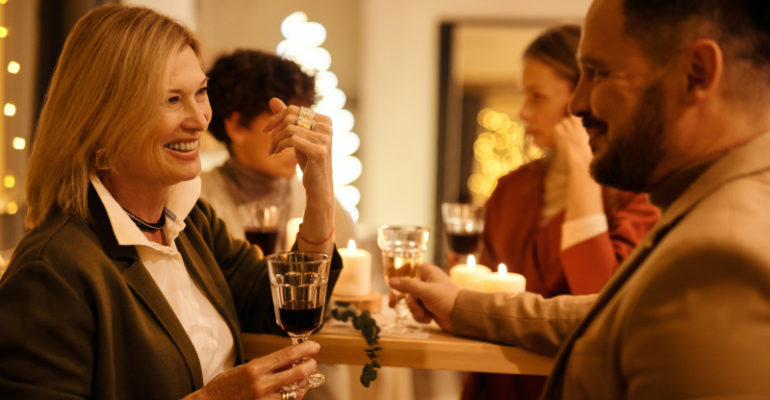 people at a holiday party mingling